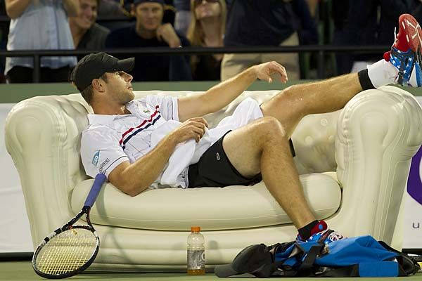 Andy Roddick In Action On The Tennis Court Background