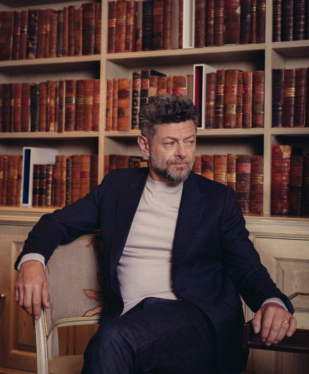 Andy Serkis In Library Background