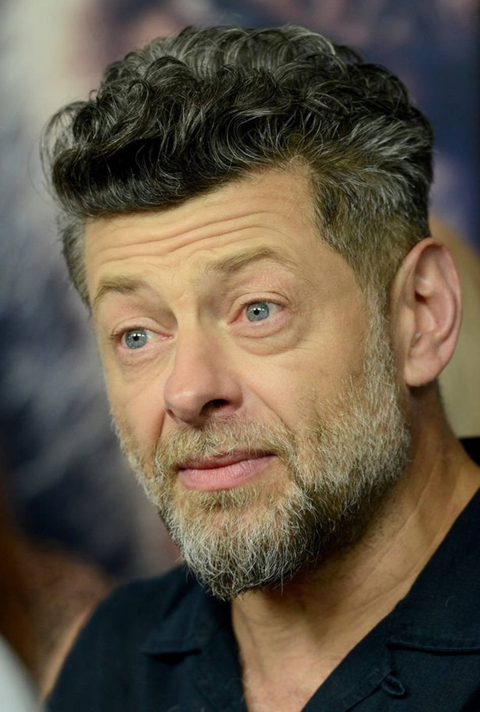 Andy Serkis Looks Intently Background