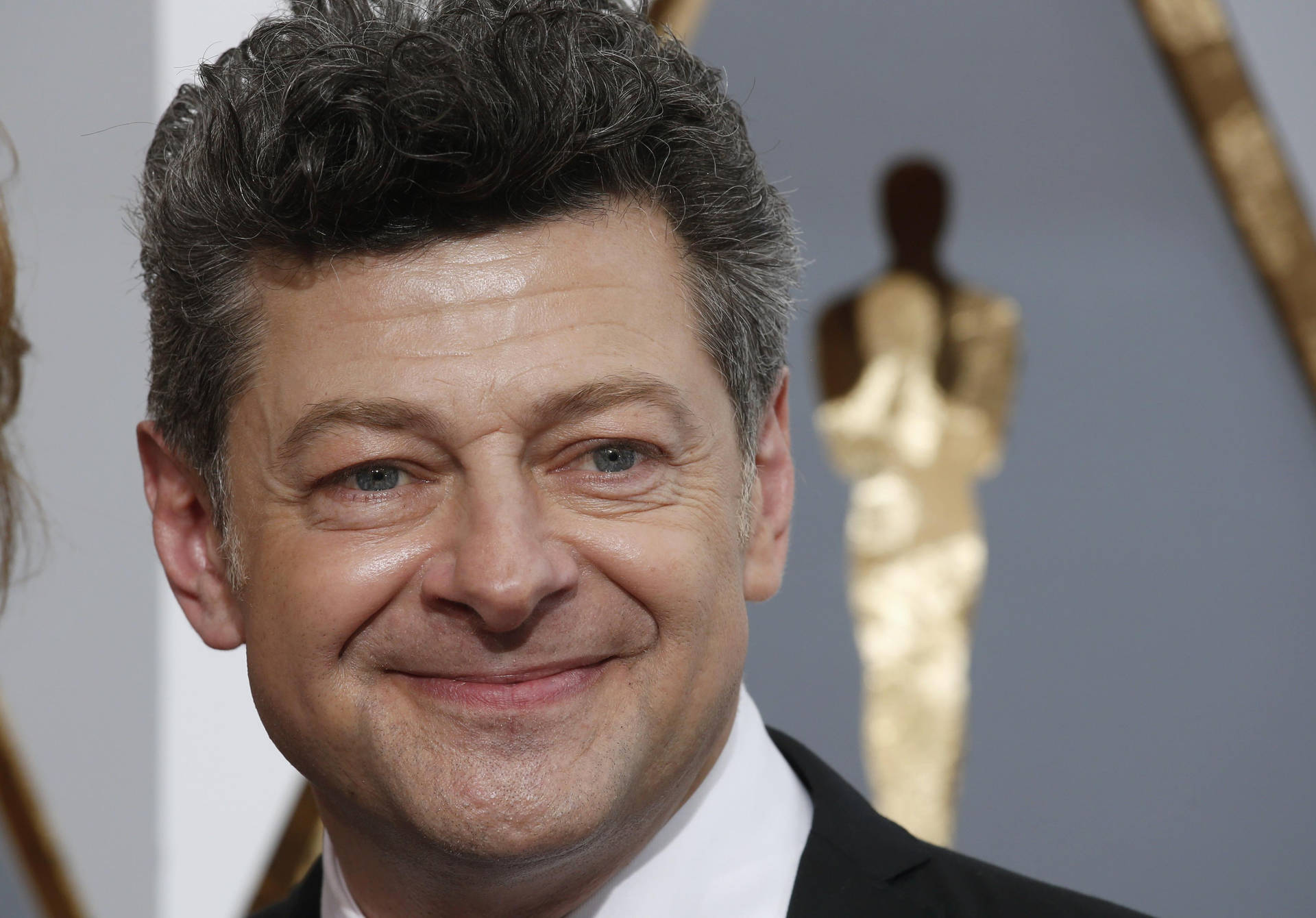 Andy Serkis Smiling Background