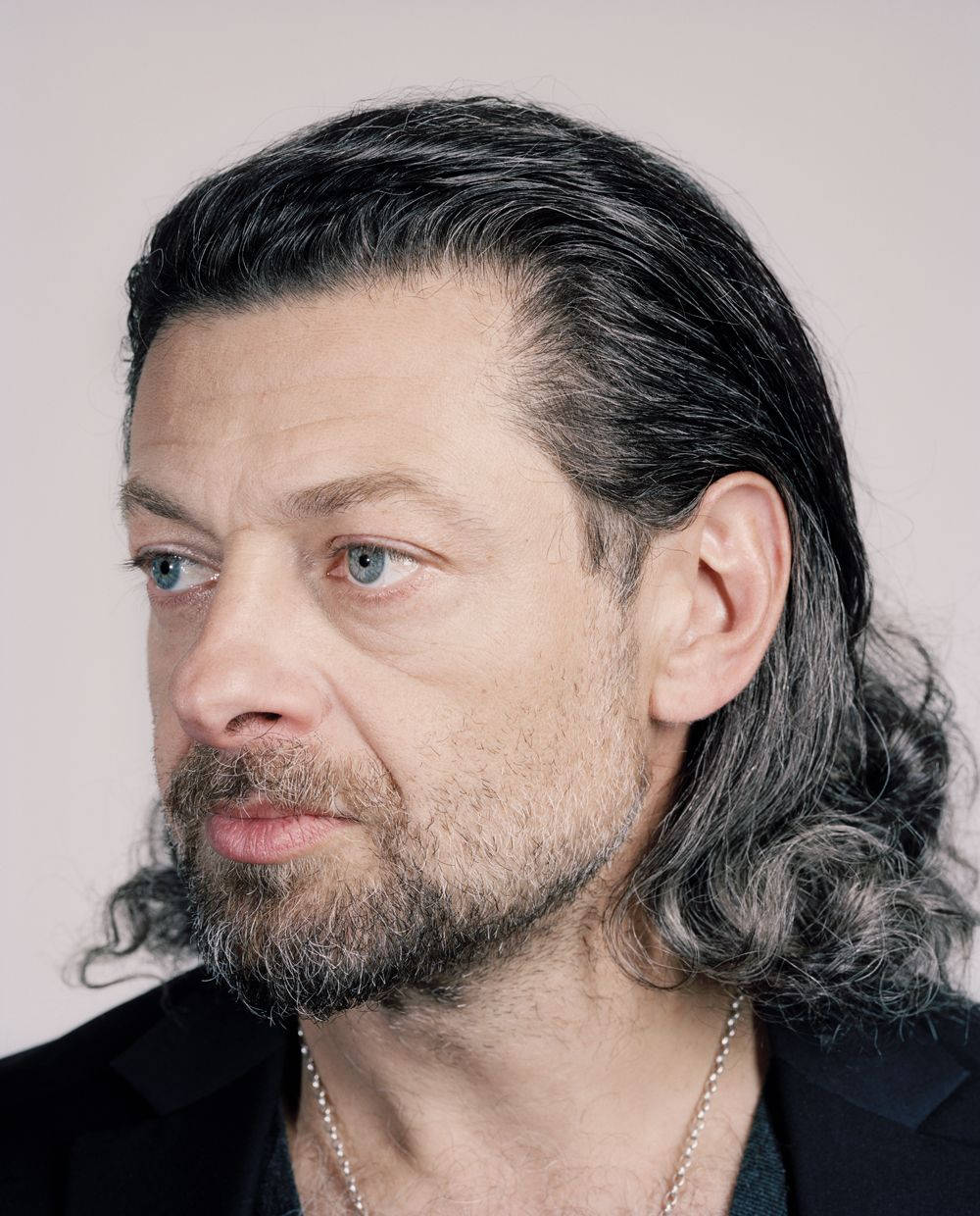 Andy Serkis With Long Hair Background