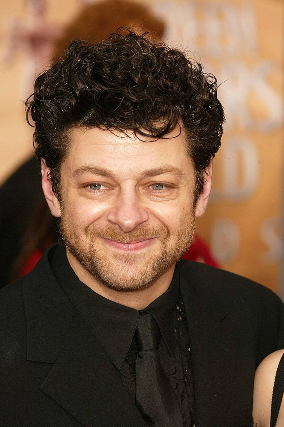 Andy Serkis With Rugged Hair Background