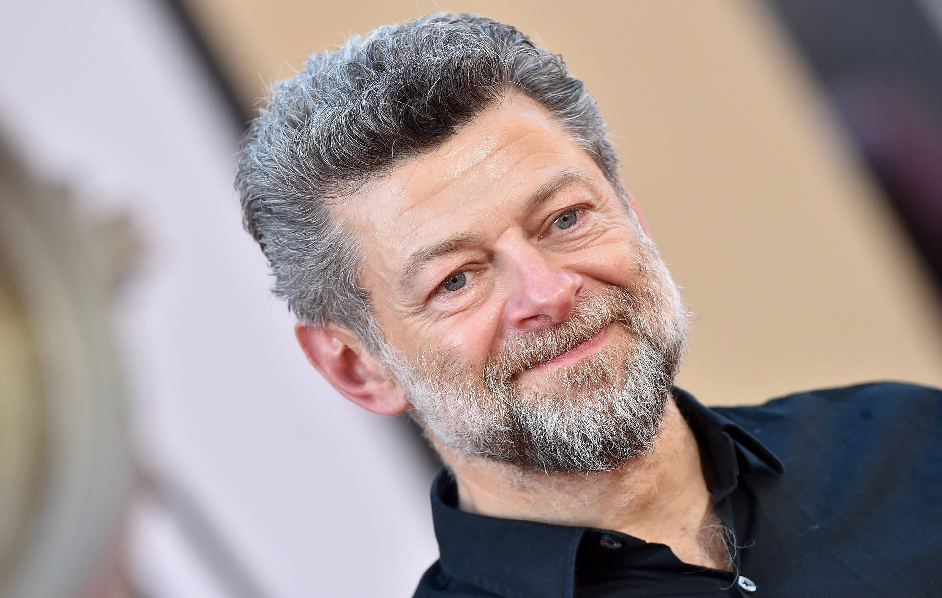 Andy Serkis With White Hair Background