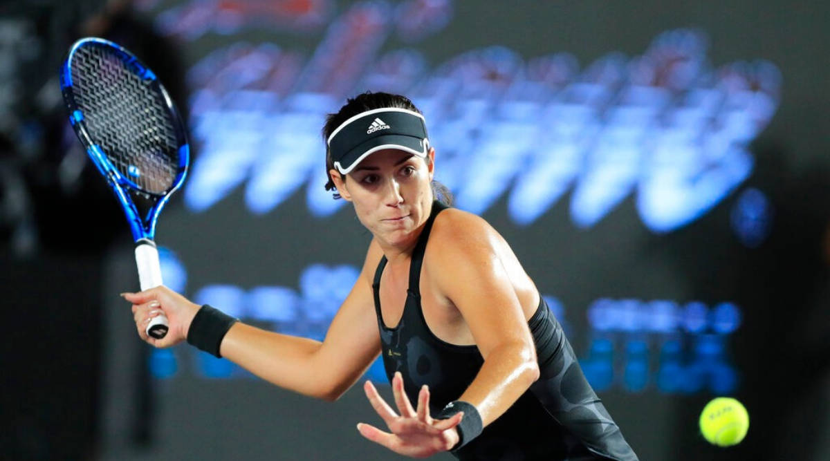 Anett Kontaveit Swinging A Blue Racket