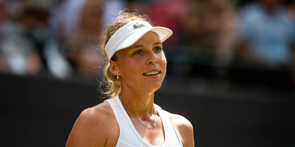 Anett Kontaveit Wearing A White Cap Background