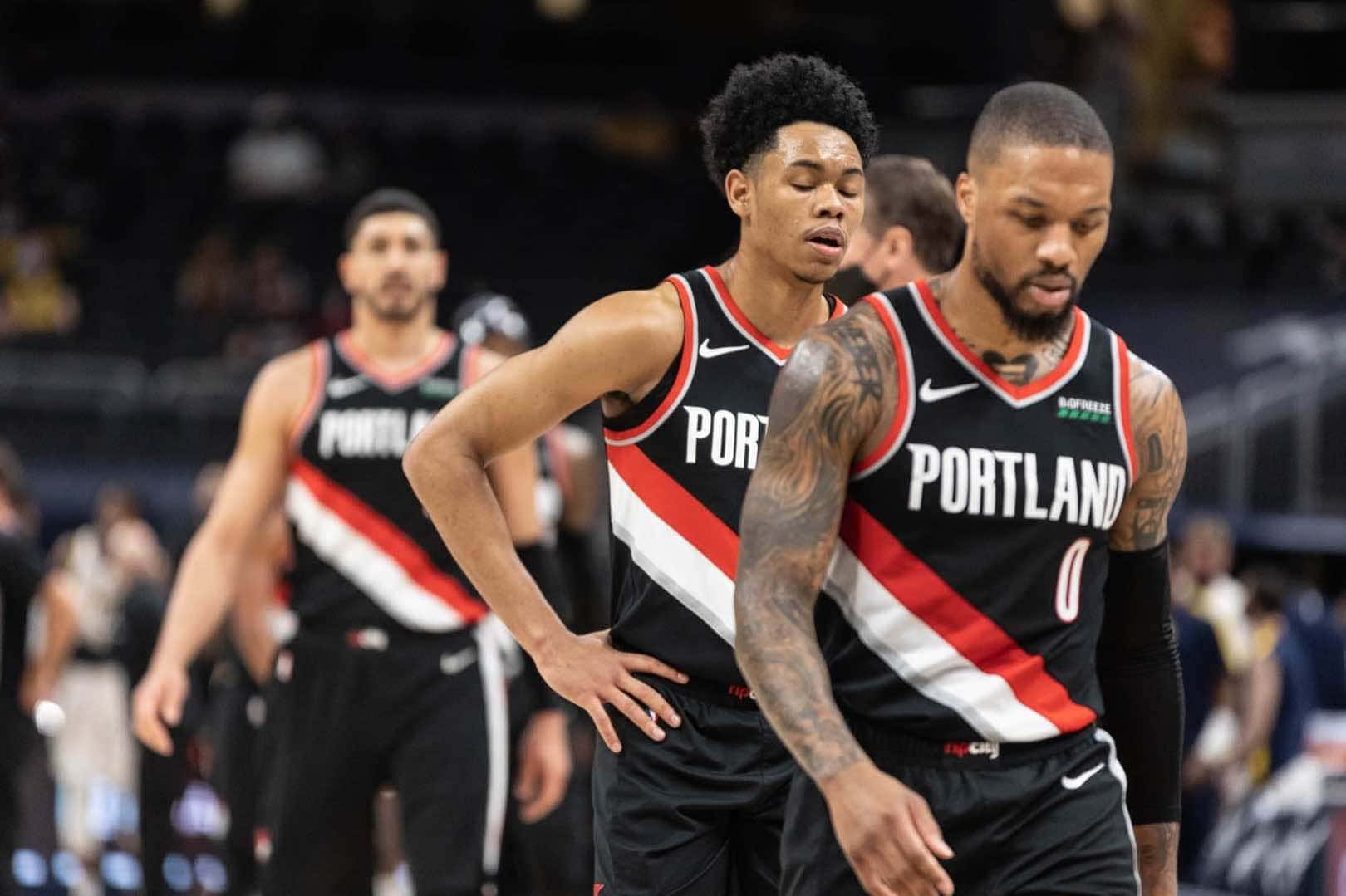Anfernee Simons With Superstar Damian Lillard Background