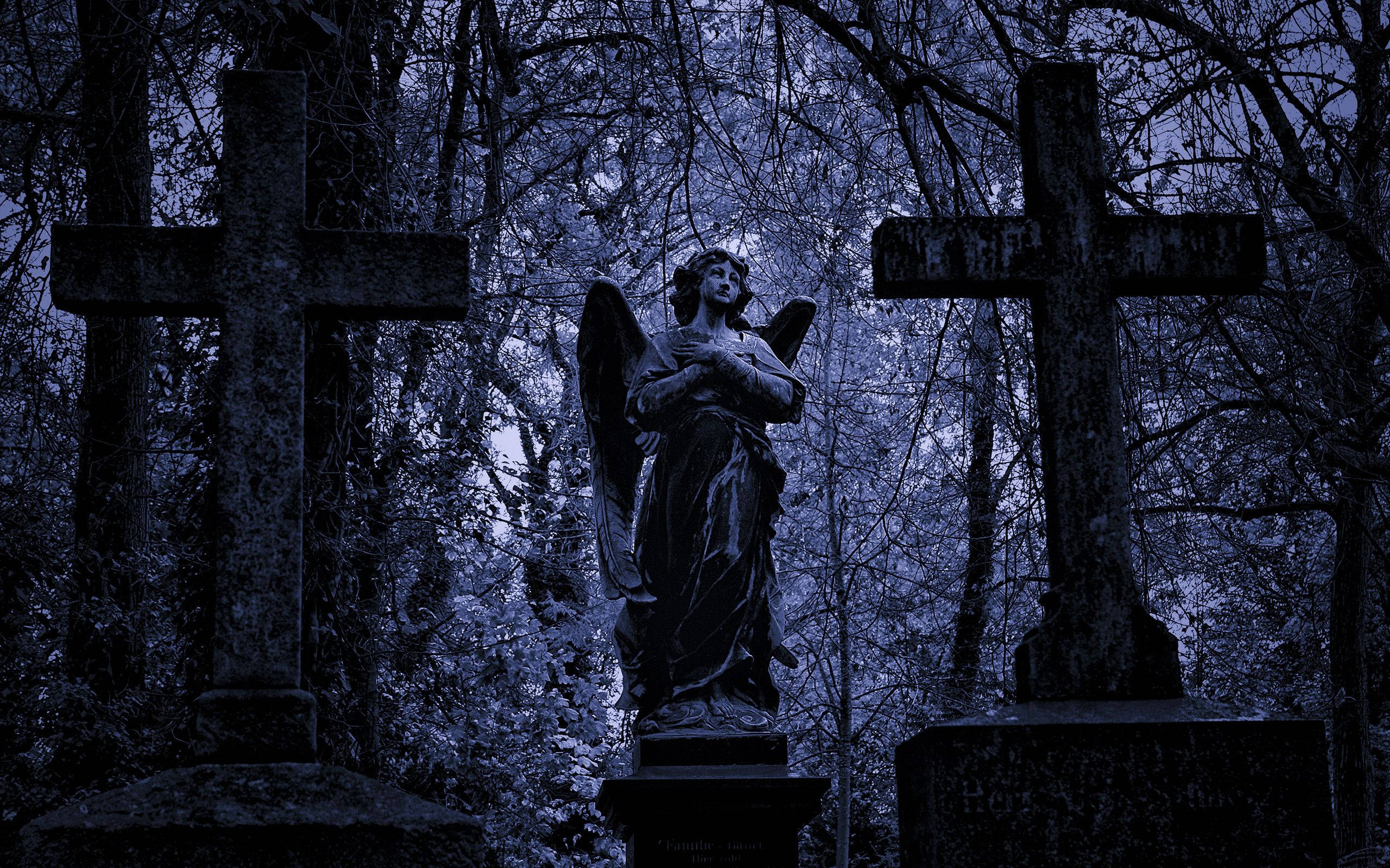 Angel Statue In A Graveyard Background