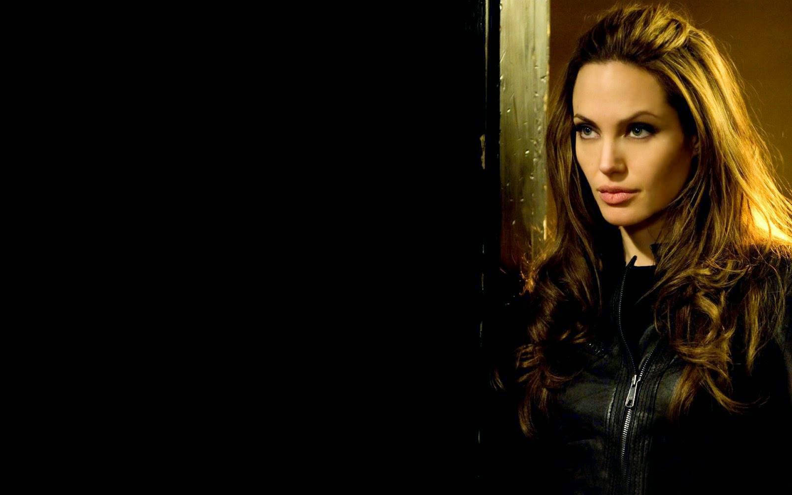 Angelina Jolie Strikes A Powerful Pose In All-black Leather.