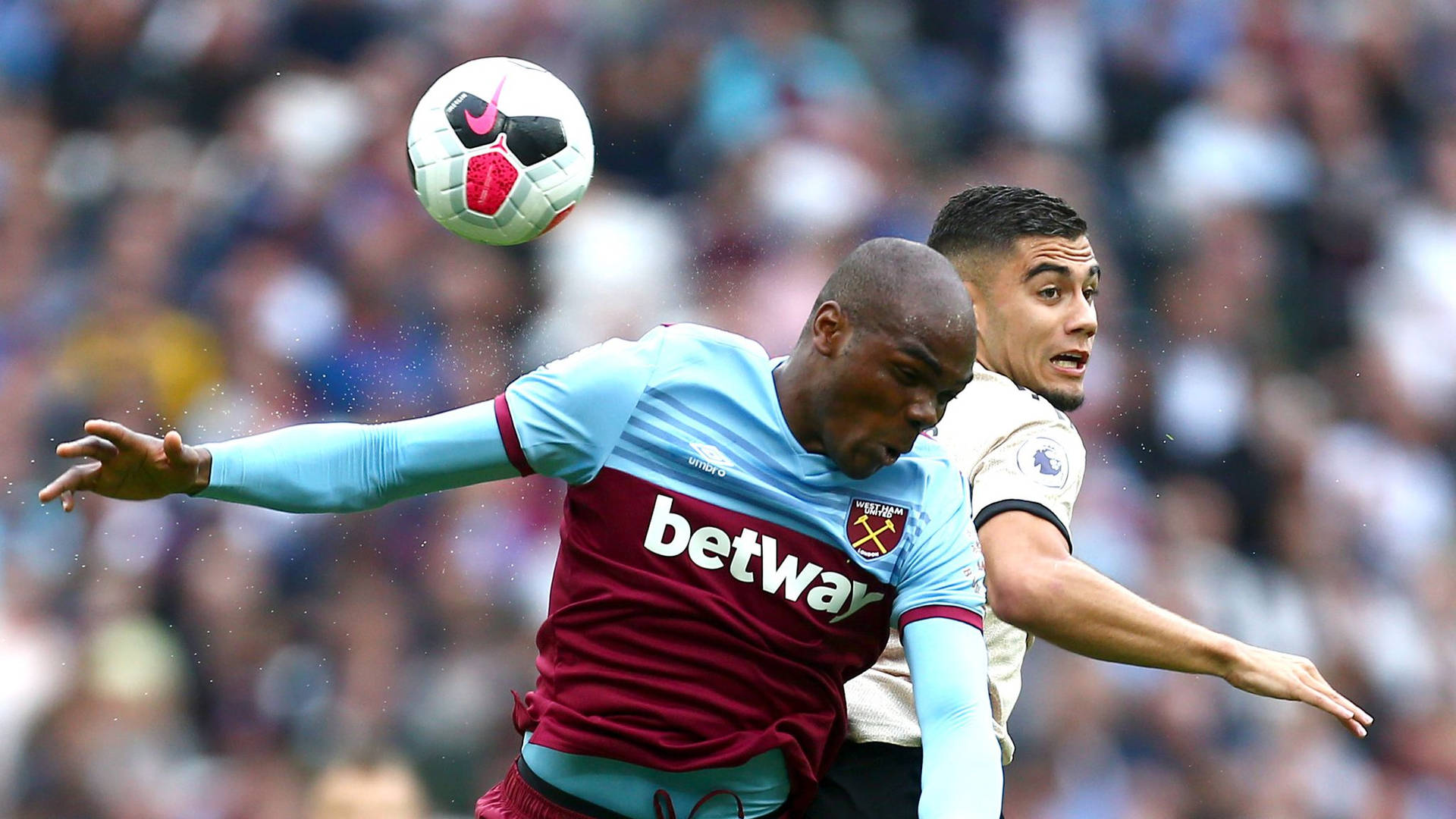 Angelo Ogbonna In Action On Field Background