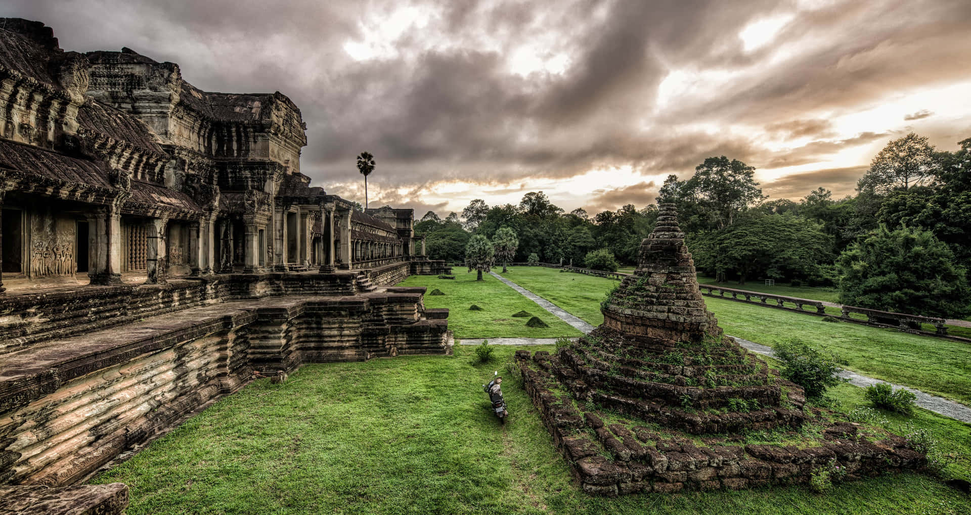 Angkor Thom Beneath Cloudy Gray Sky Background