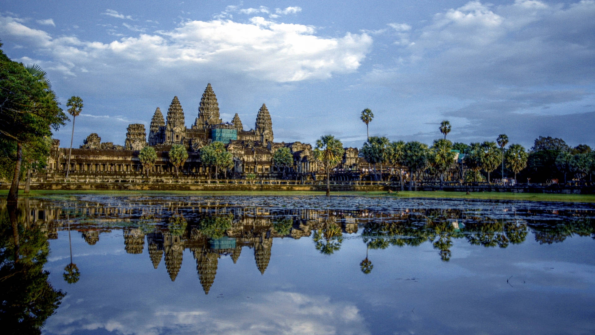 Angkor Wat Beneath The Blue Sky In Cambodia Background