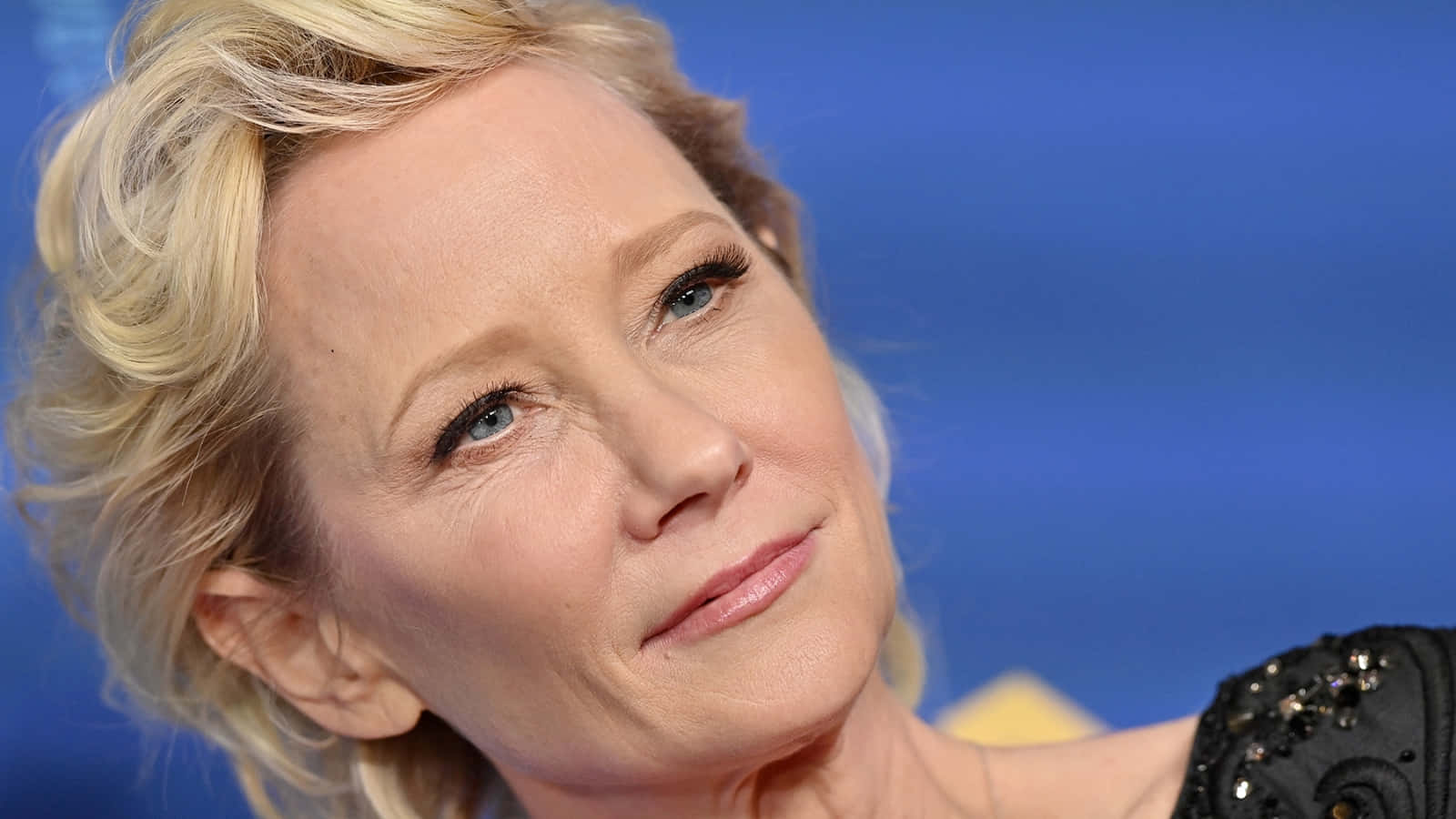 Angled Photo Of Anne Heche Background