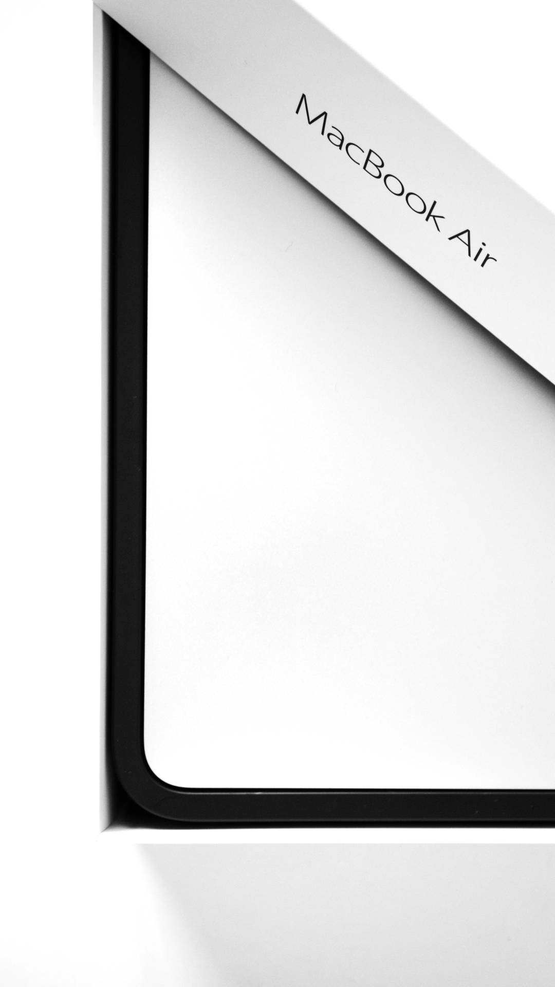 Angled View Of Macbook Air 2020 Box Background
