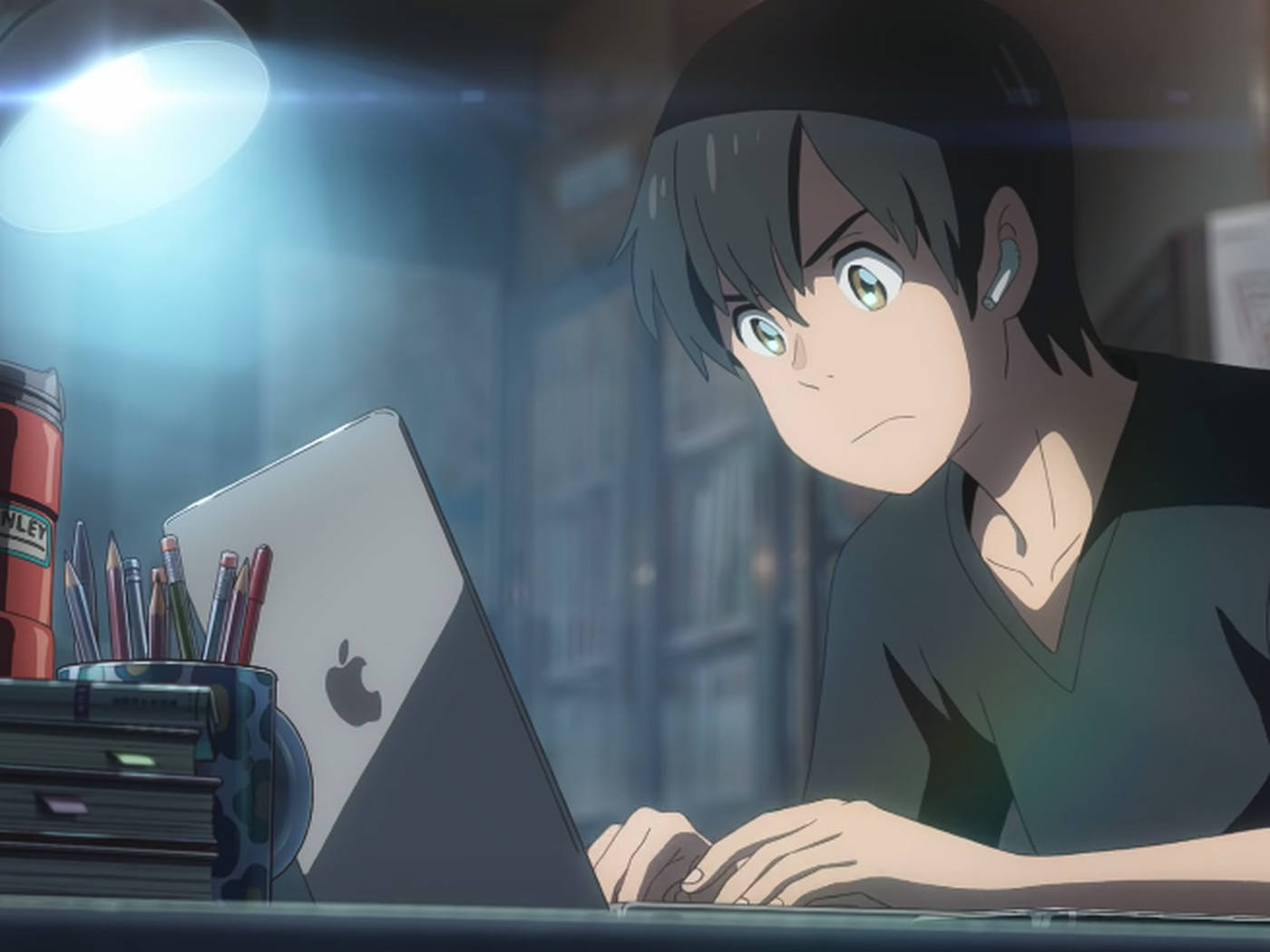 Anime Guy Typing On Macbook Laptop Background