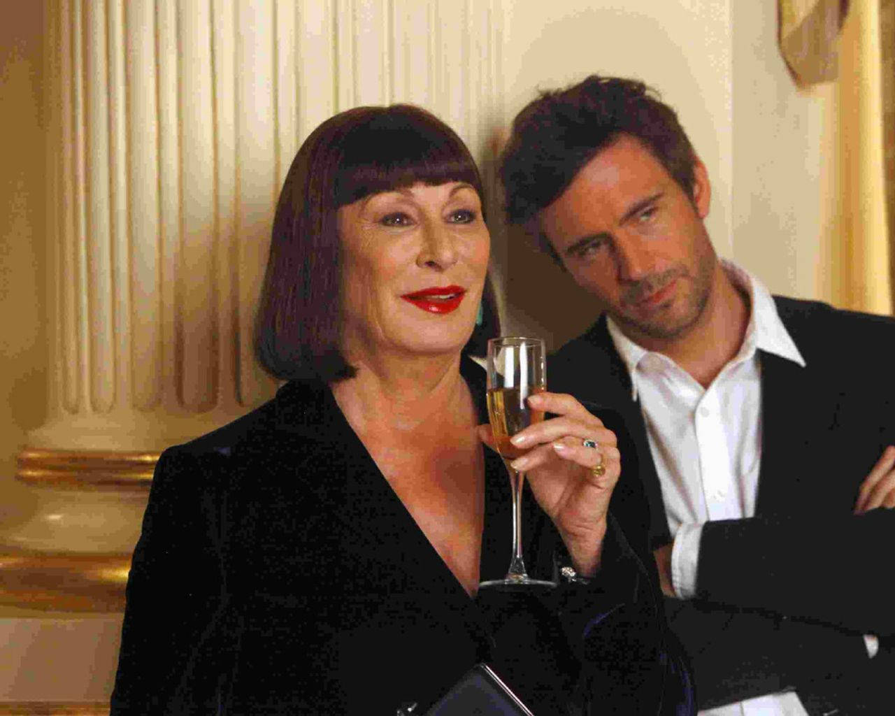 Anjelica Huston And Actor Jack Davenport Background