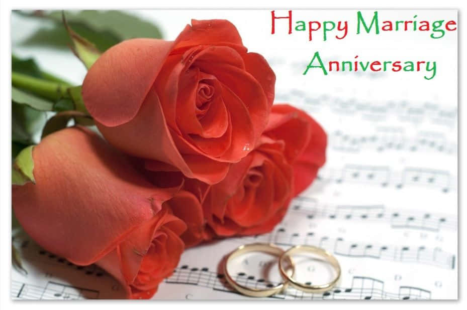 Anniversary With Roses And Wedding Rings Background