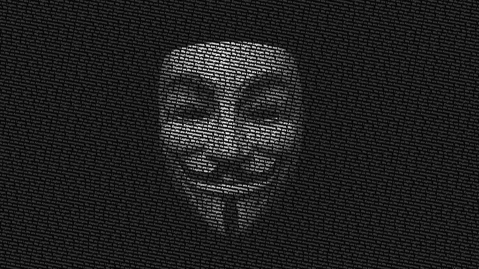 Anonymous Mask On Black Tablet Background