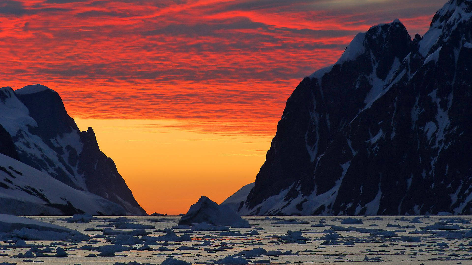Antarctica Bleeding Red Orange Sky Background