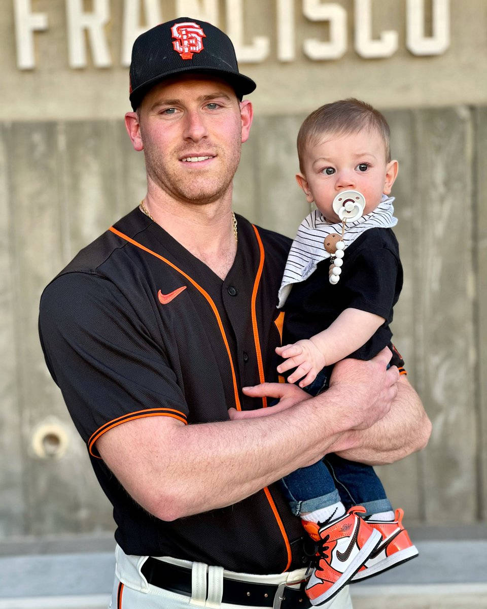 Anthony Desclafani Carrying His Baby Background