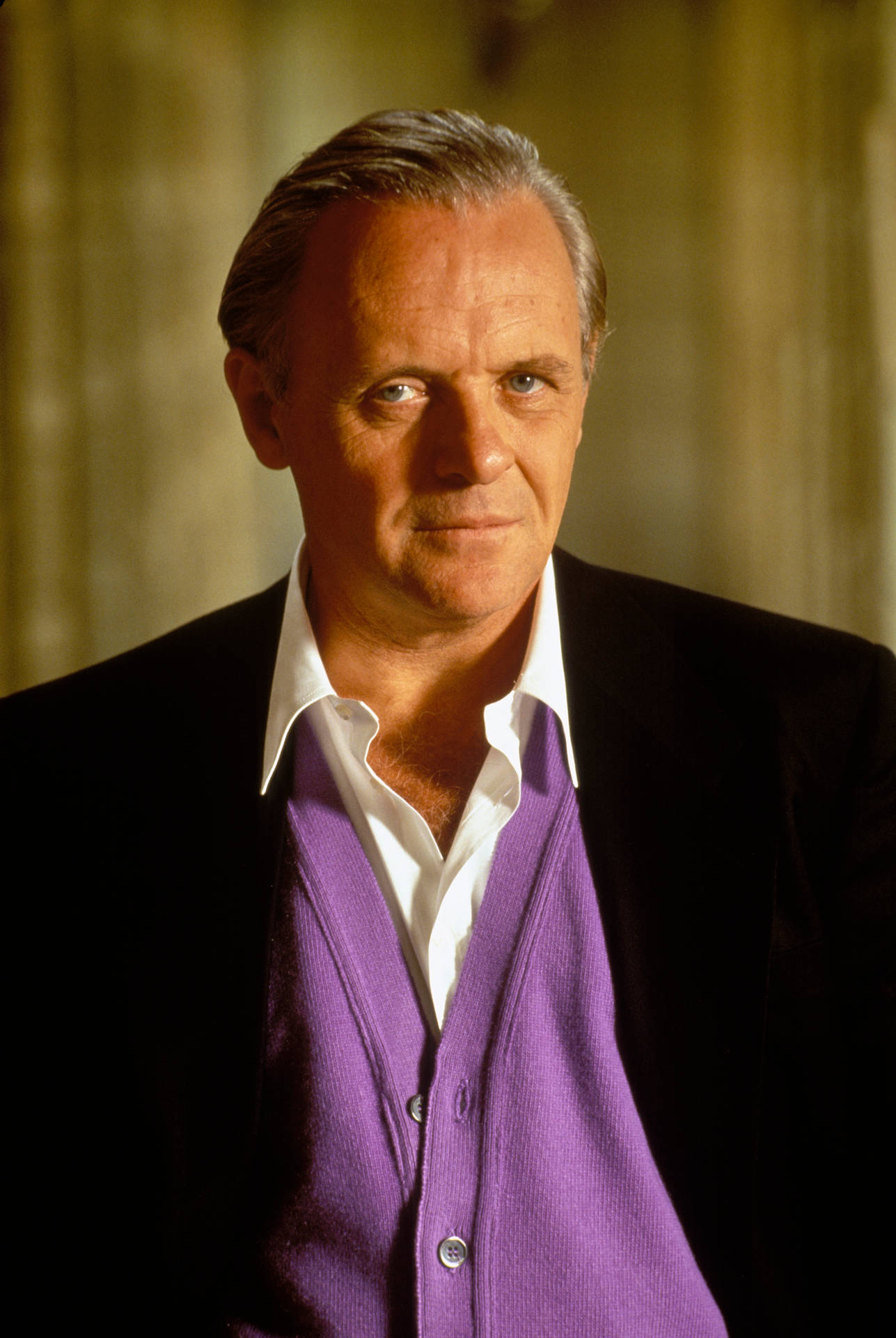 Anthony Hopkins In Purple Blazer Background