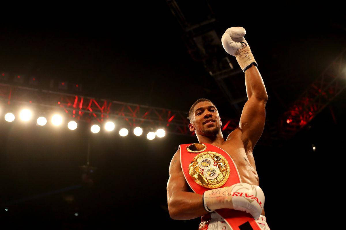 Anthony Joshua Fist Up Belt Background