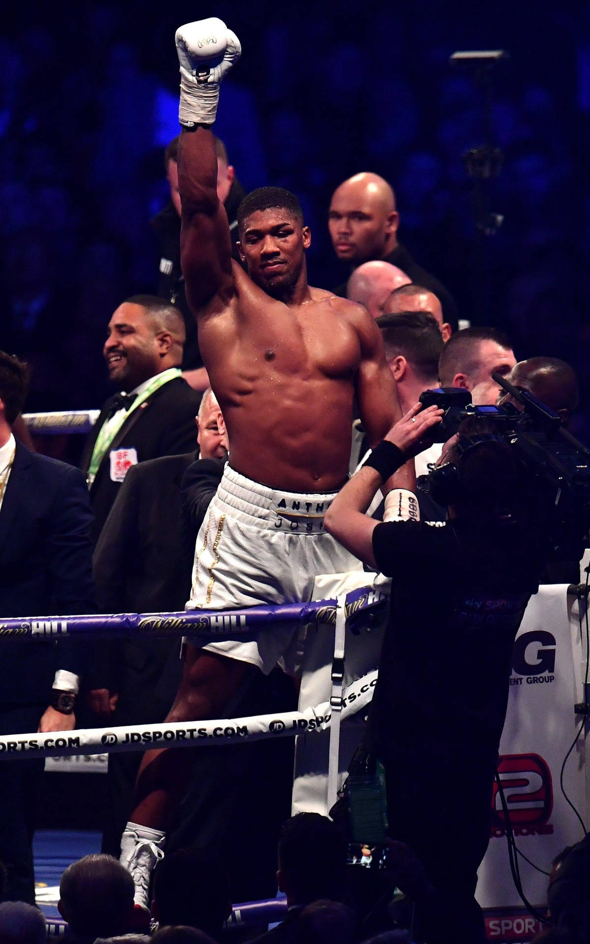 Anthony Joshua Raised Right Hand Background