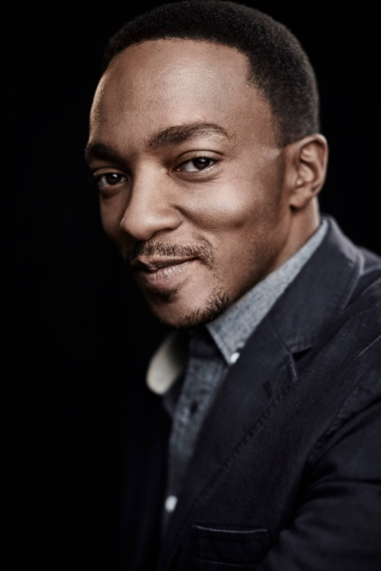 Anthony Mackie Shy Smile Background