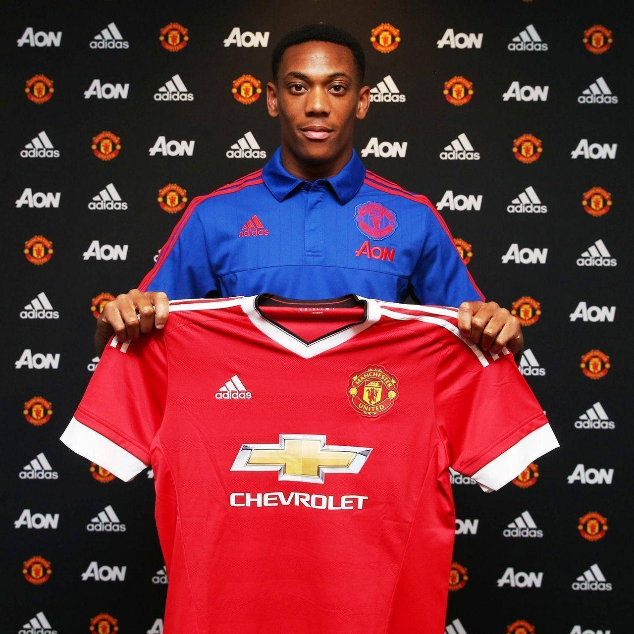 Anthony Martial Holding Jersey Background