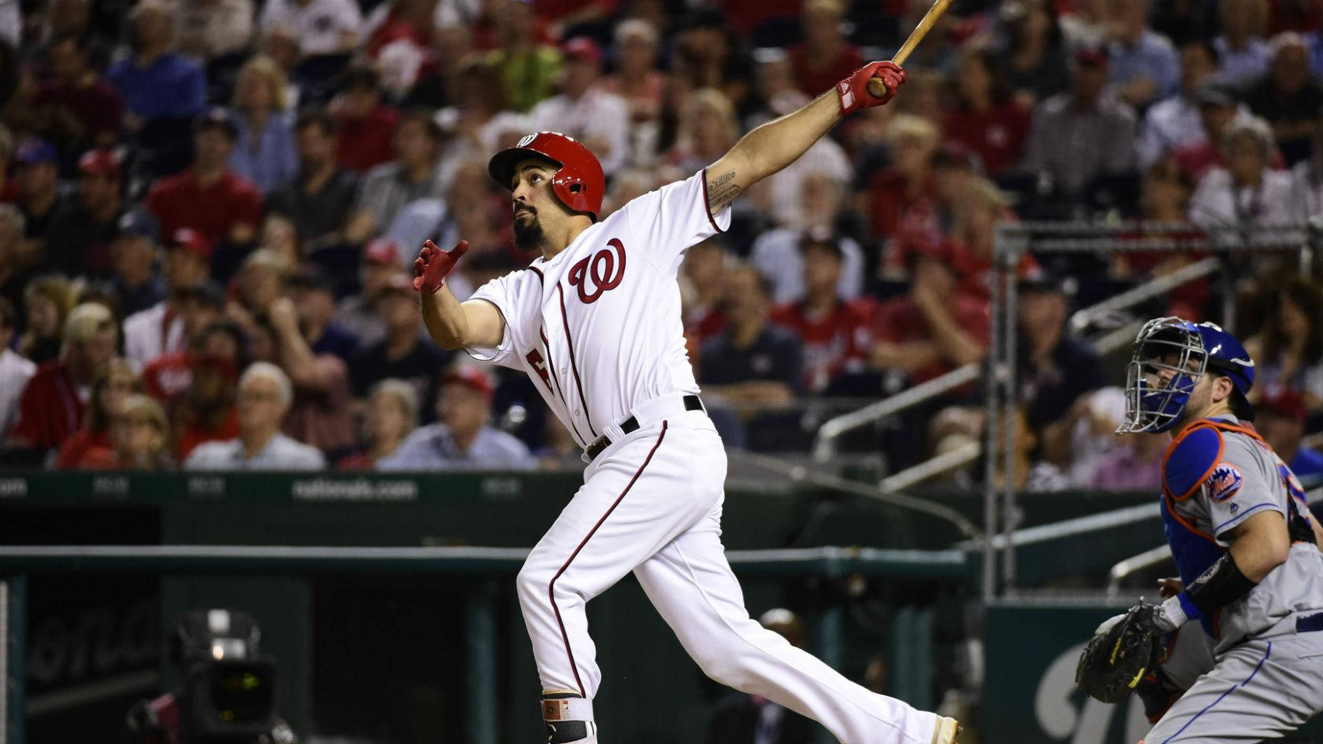 Anthony Rendon Running While Holding A Bat Background