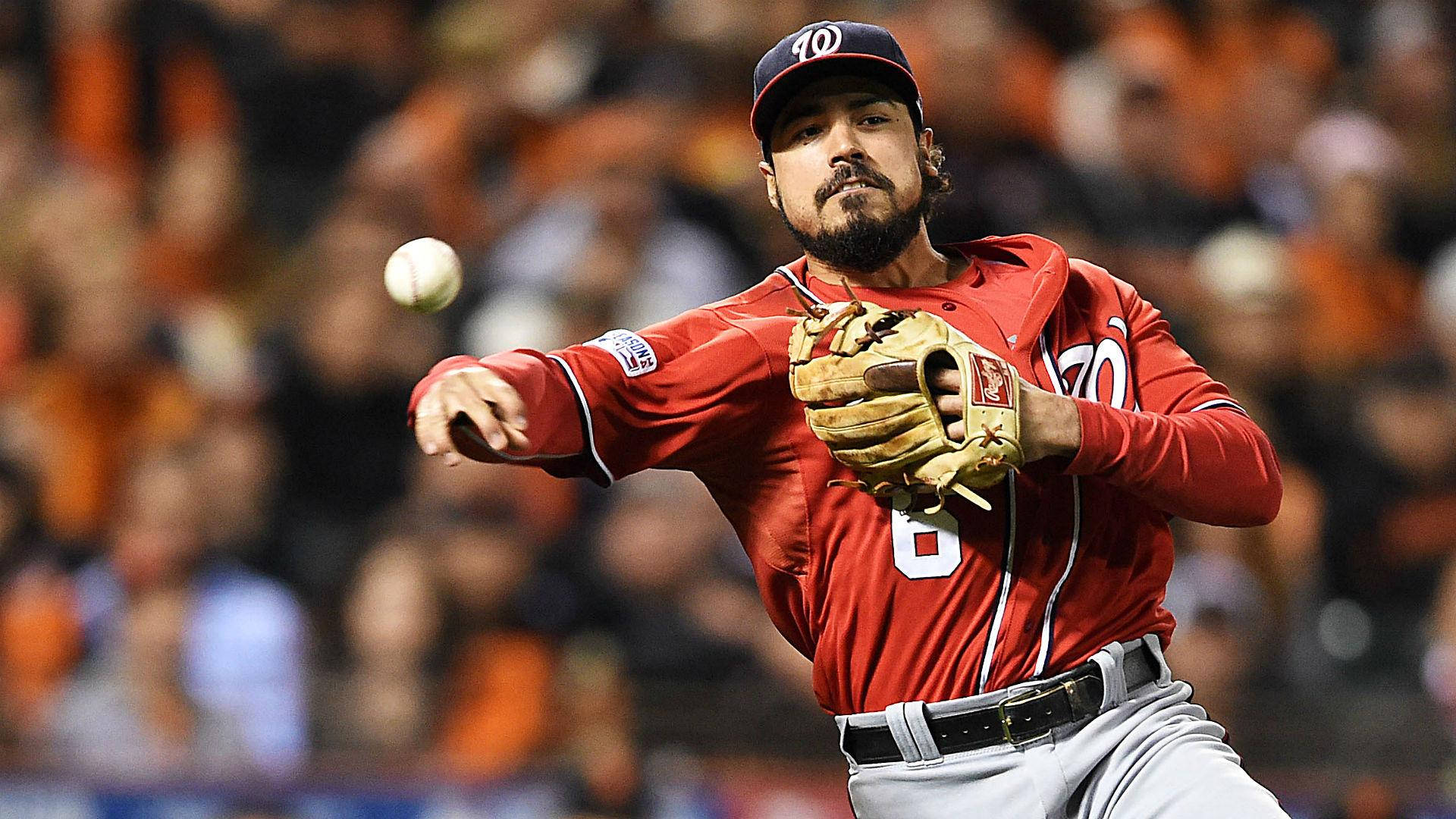 Anthony Rendon Throwing Ball In Red Uniform Background