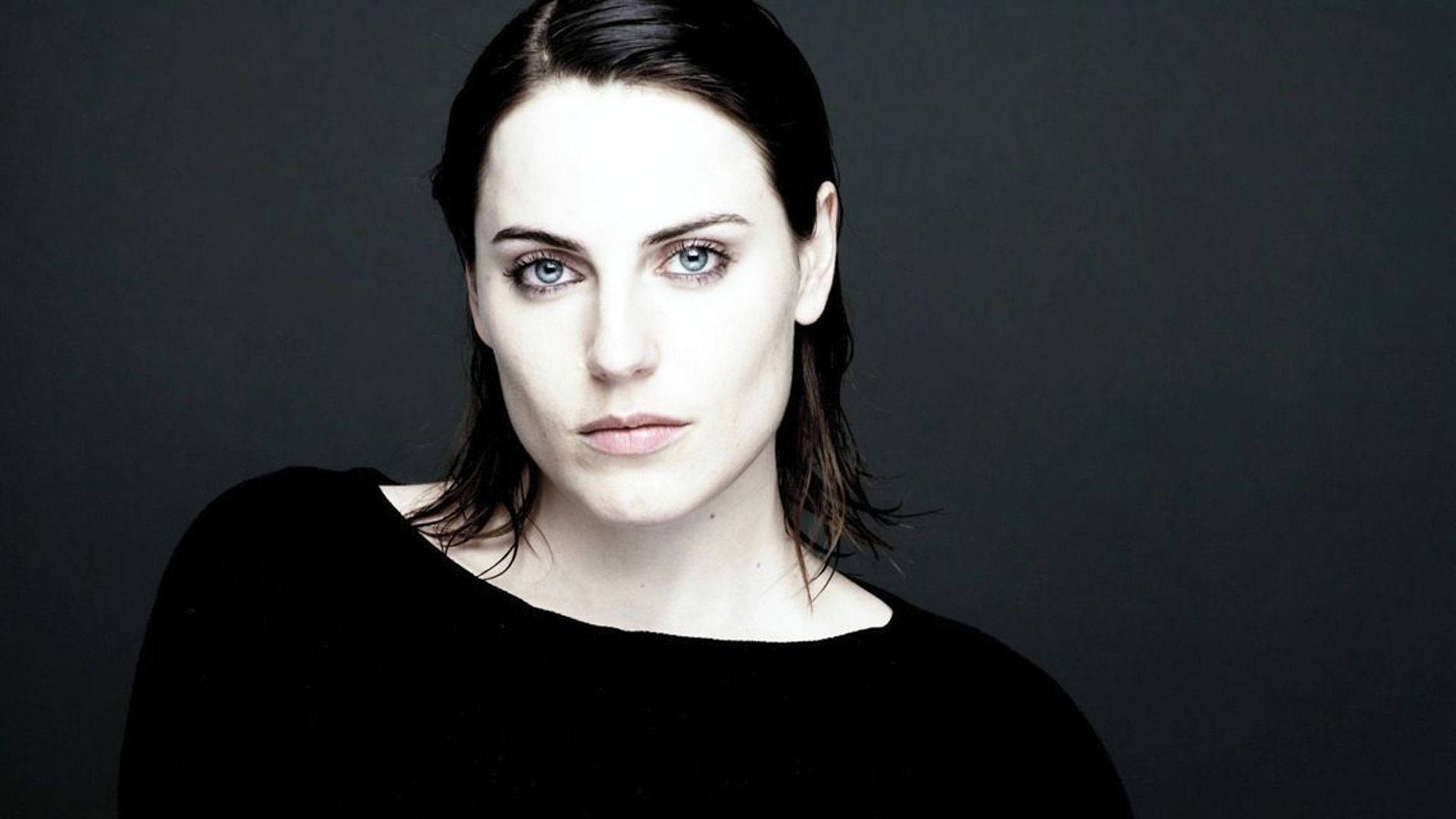 Antje Traue In Her Wet Look Background