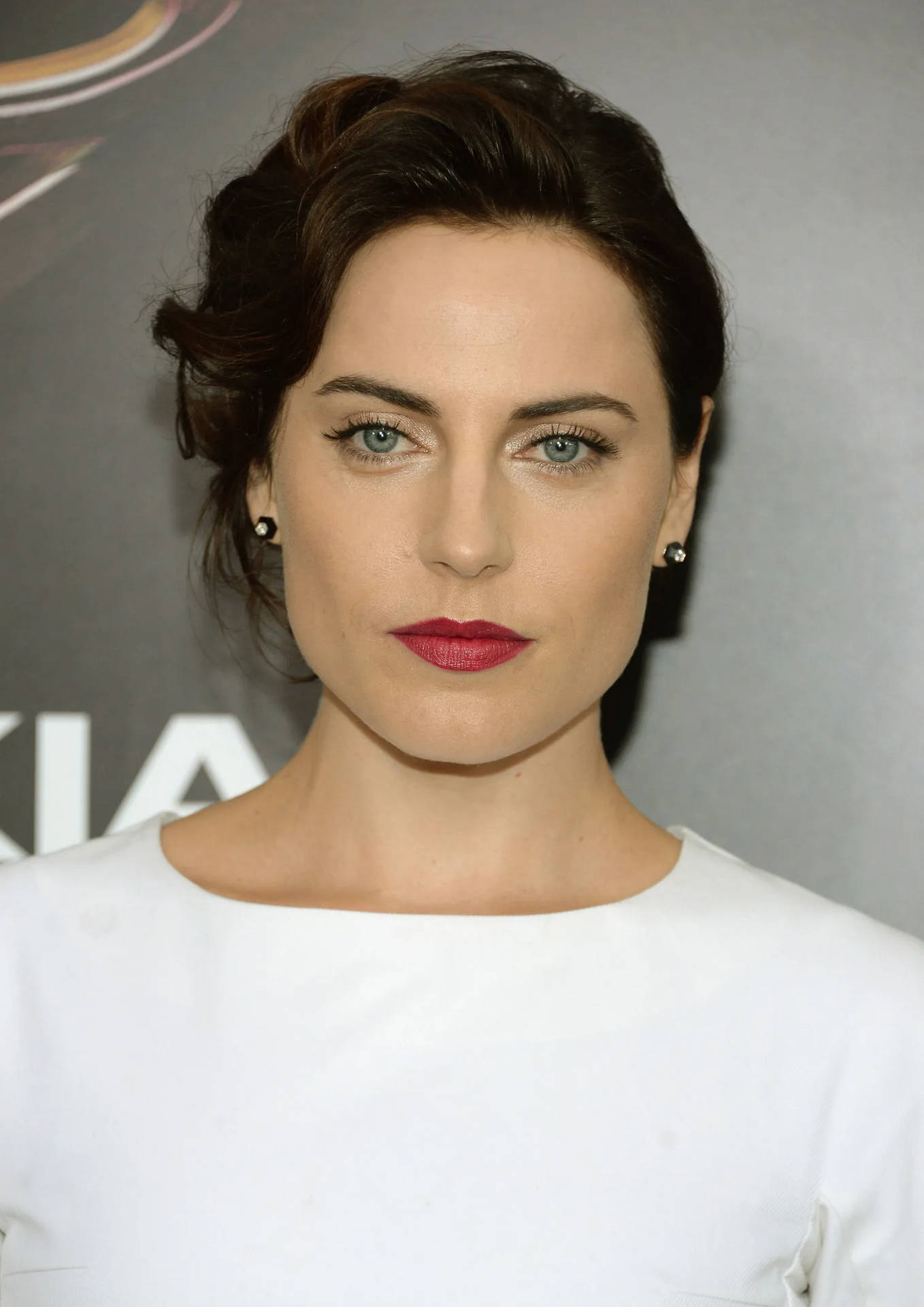 Antje Traue On Gray Printed Backdrop Background