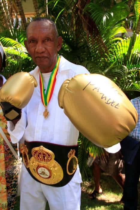 Antonio Cervantes Golden Gloves And Champion Belt Background