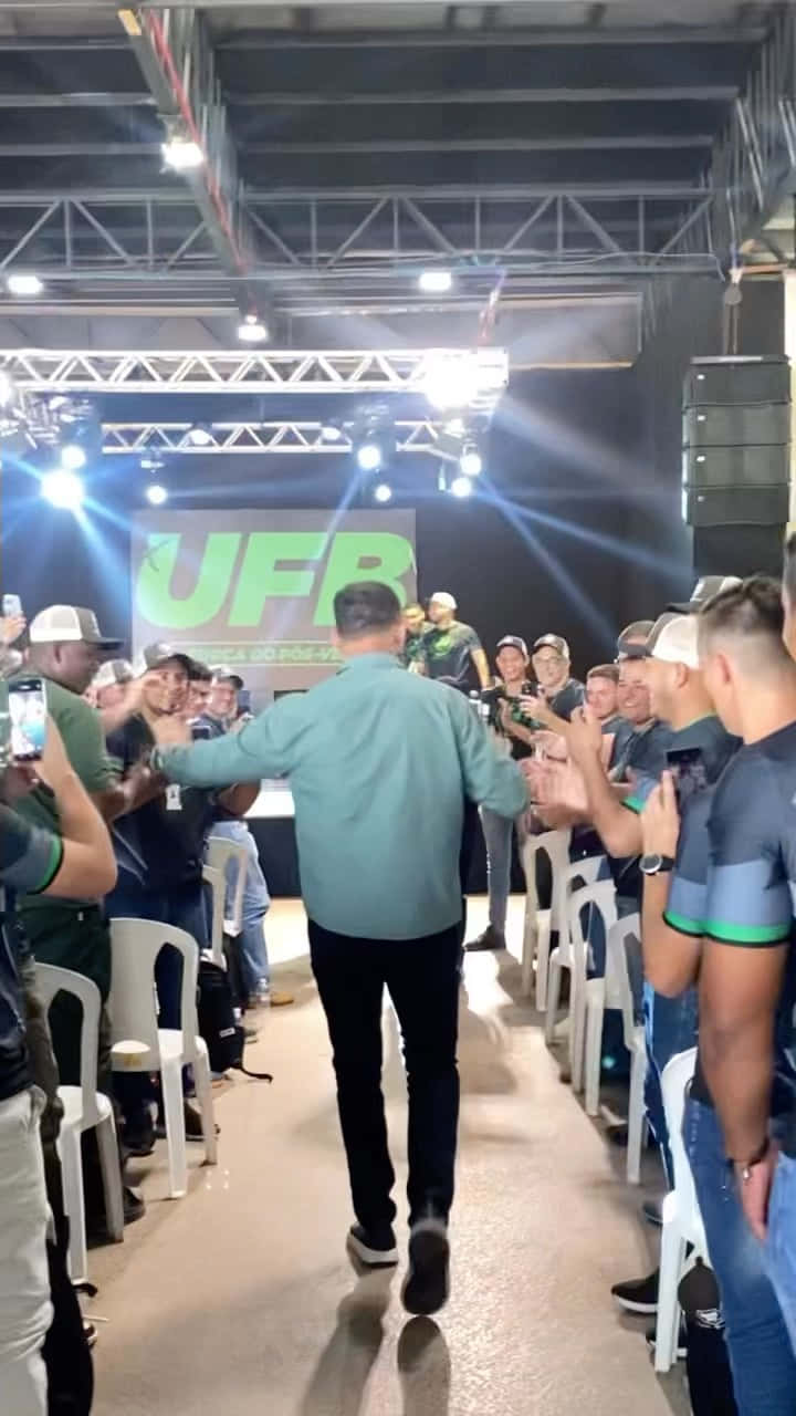Antônio Rodrigo Nogueira Walking Into Event Background