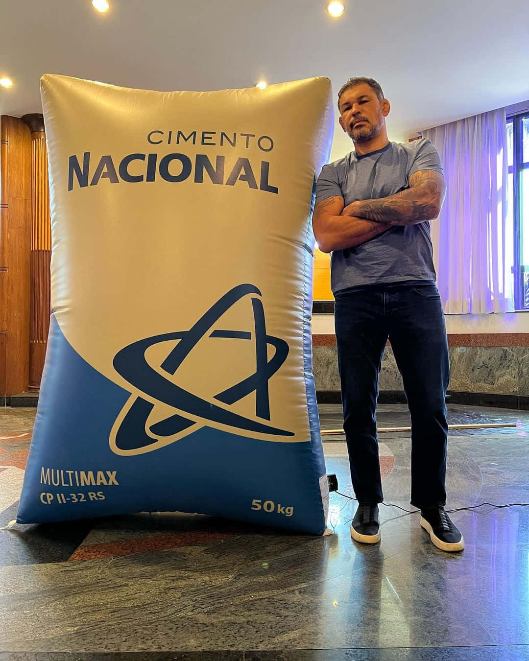 Antônio Rodrigo Nogueira With Cement Bag