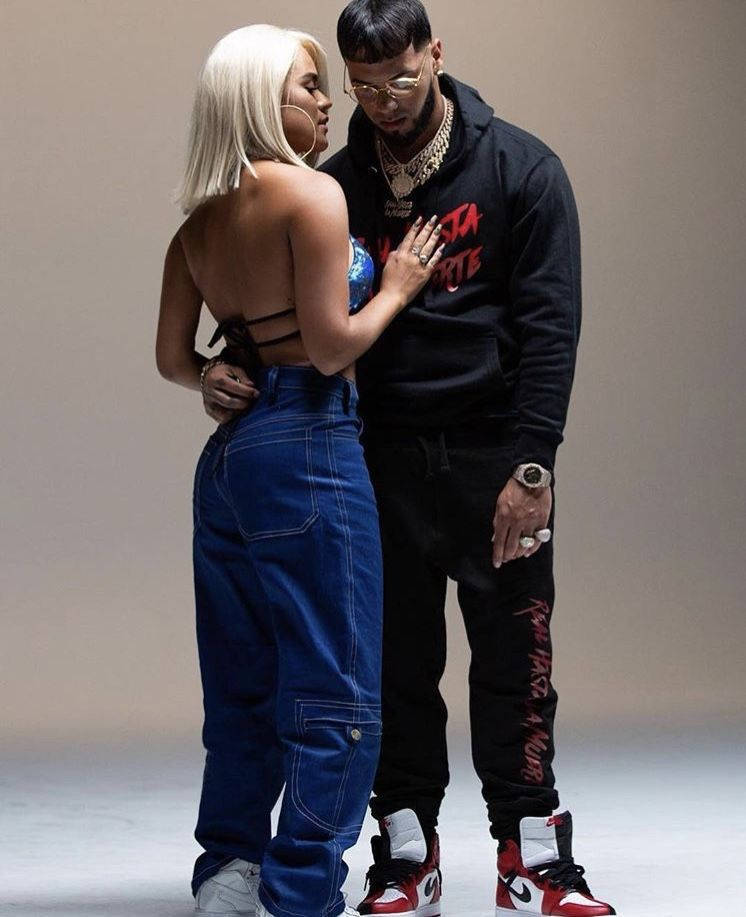 Anuel Aa Photoshoot With Carol G Background