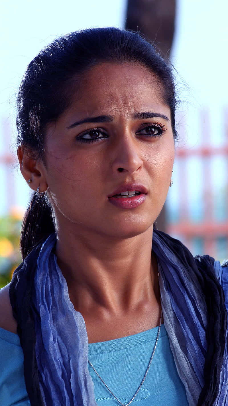 Anushka Shetty Concerned Expression Background