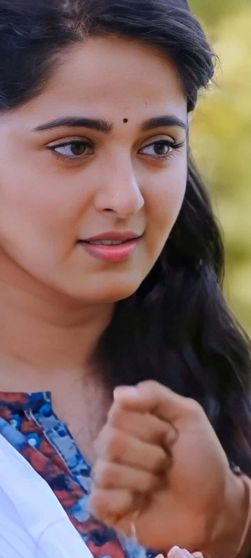 Anushka Shetty Elegant Closeup Background