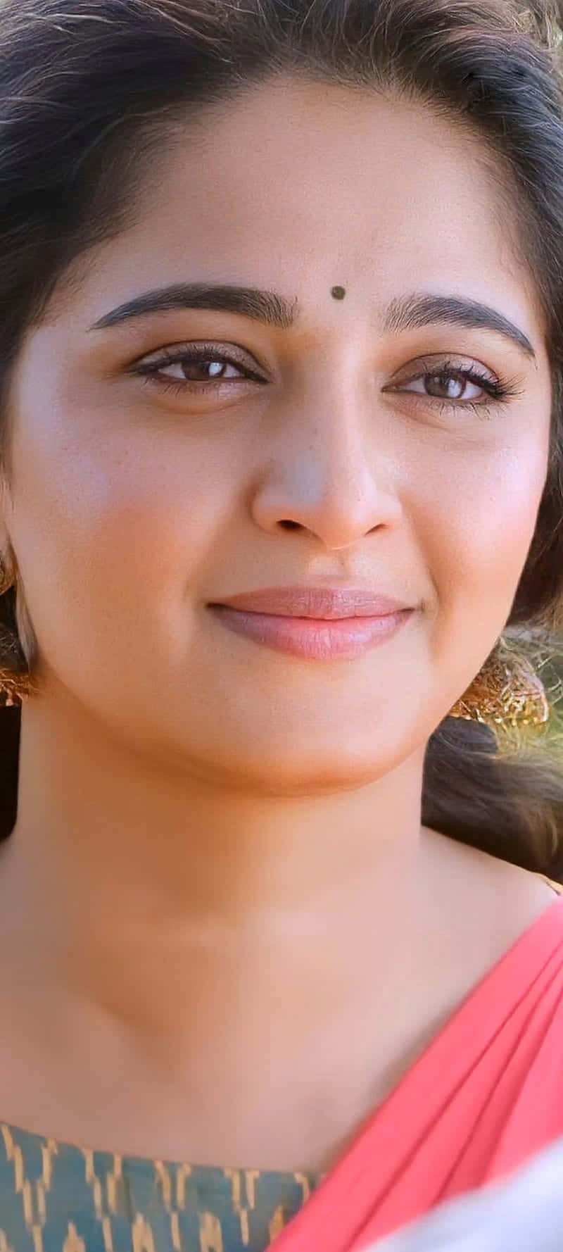 Anushka Shetty Elegant Closeup Background