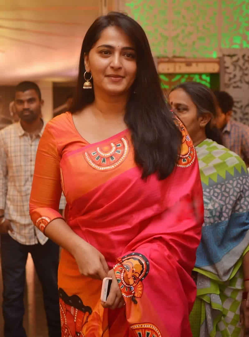 Anushka Shetty Orange Saree Event Appearance Background