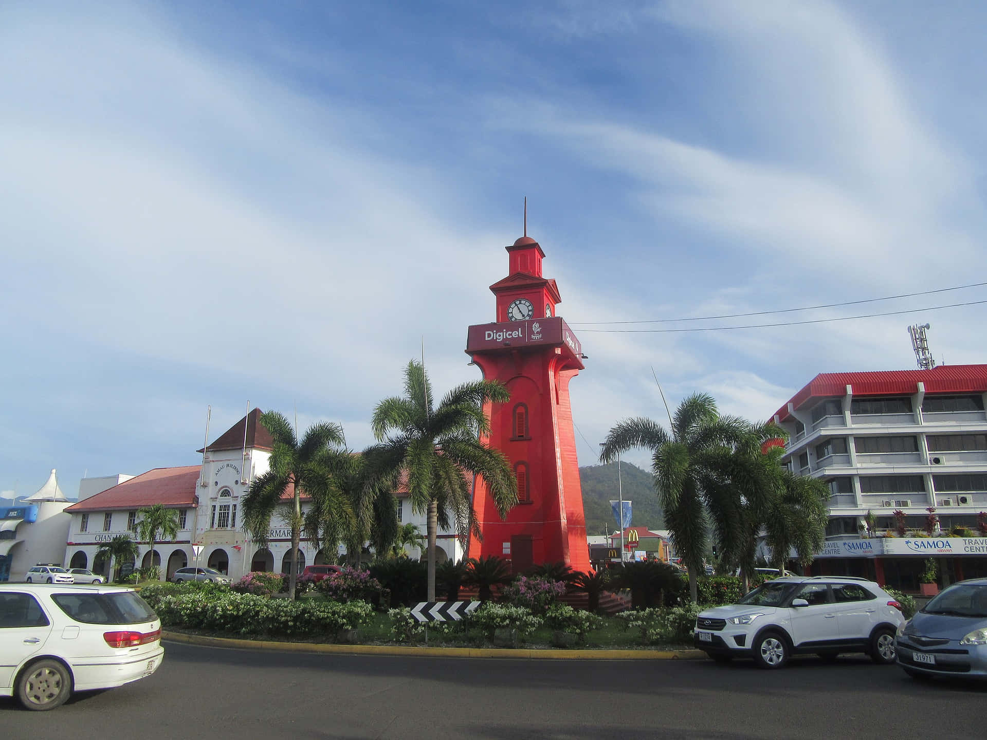 Apia Town Clock Tower Standing Tall On A Gloomy Day Background