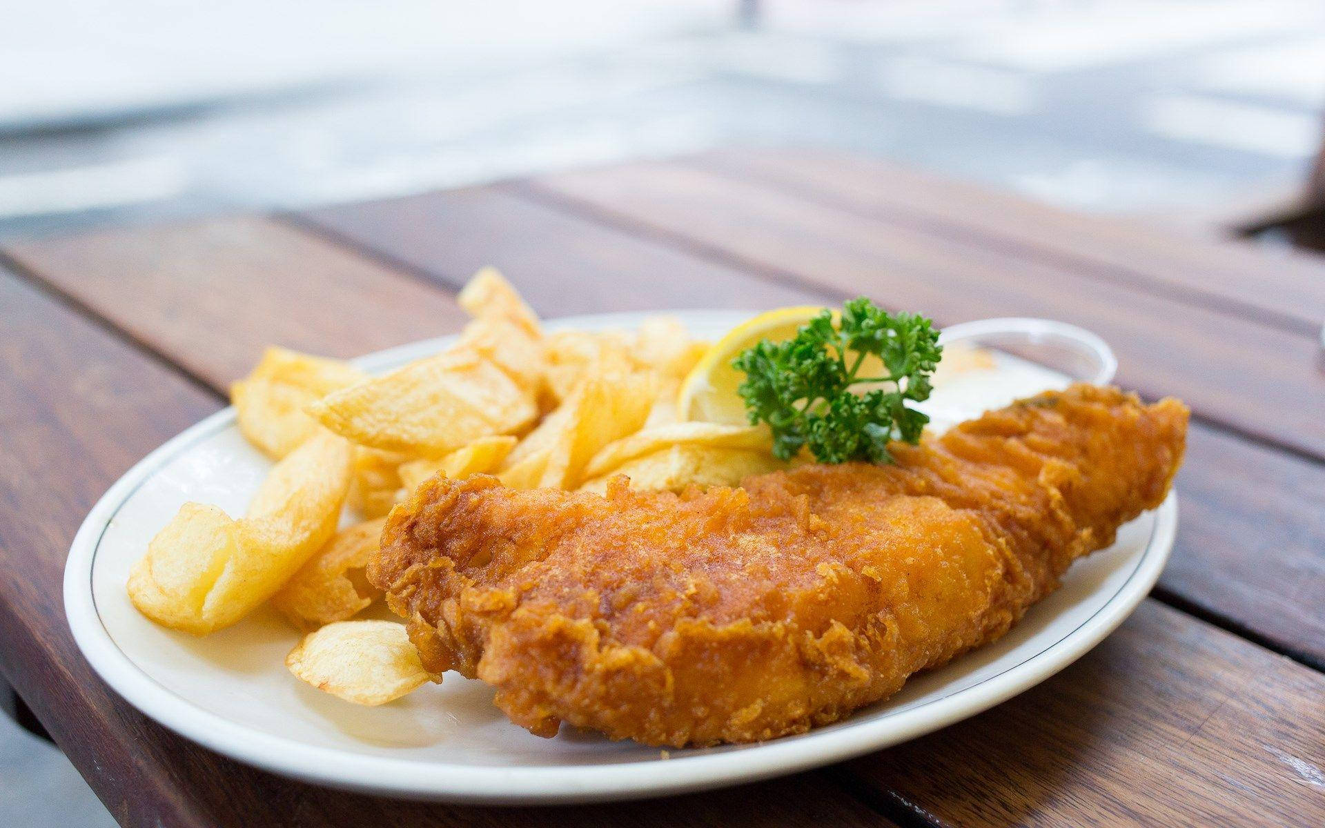 Appetizing Plate Of British Fish And Chips