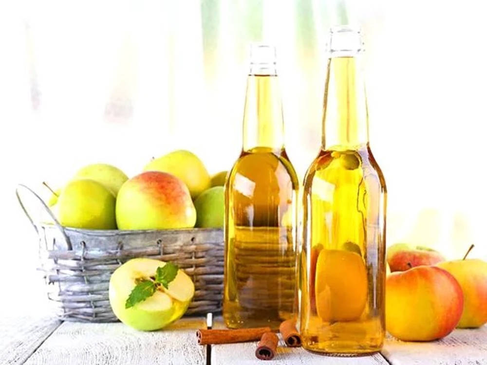 Apple Cider Vinegar In Bottles Background