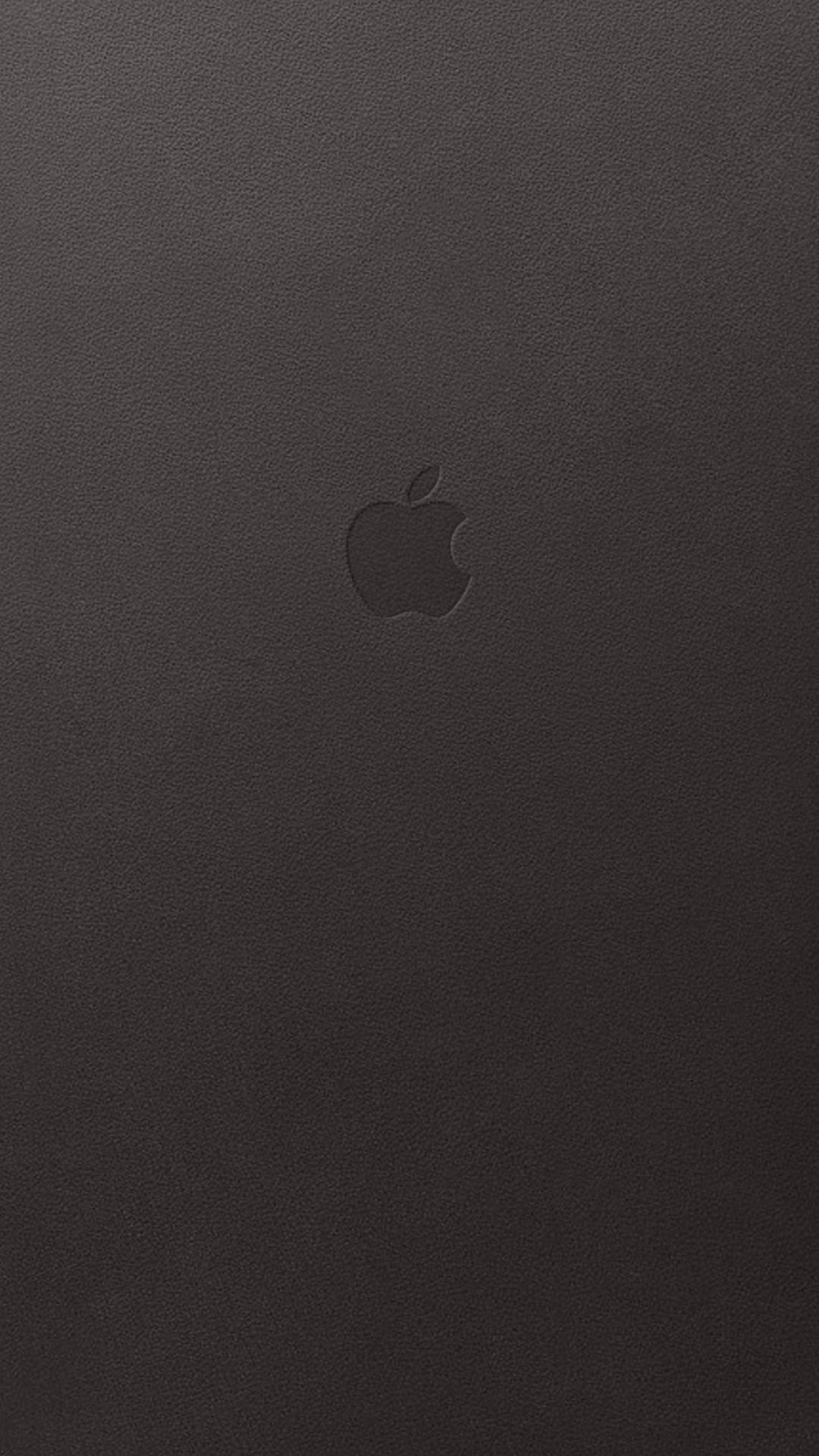 Apple Logo On Black Leather Iphone Background