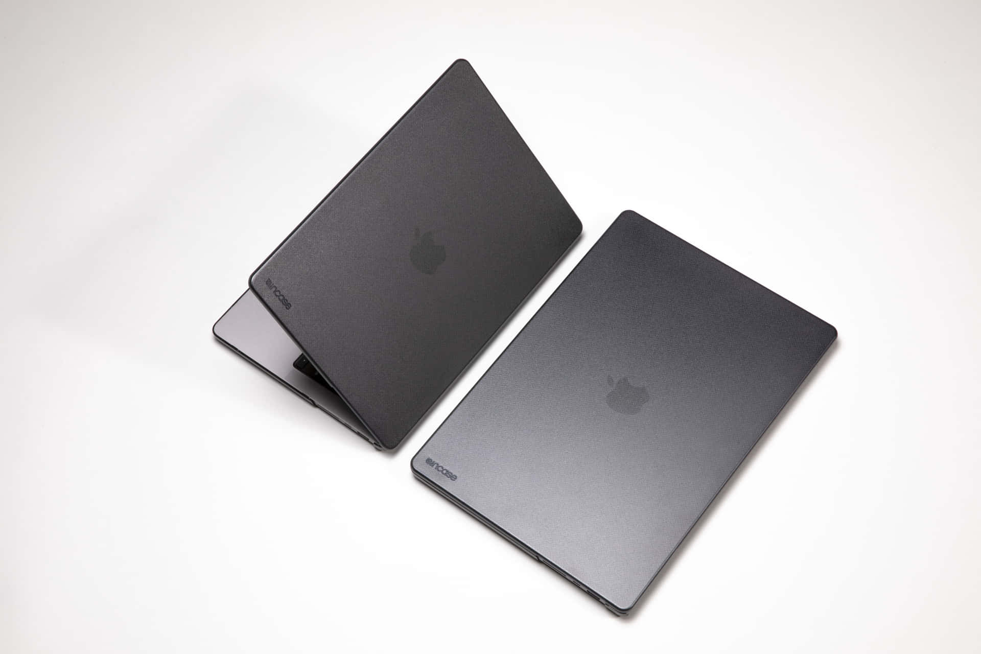 Apple Macbook In Stylish Black Color Background