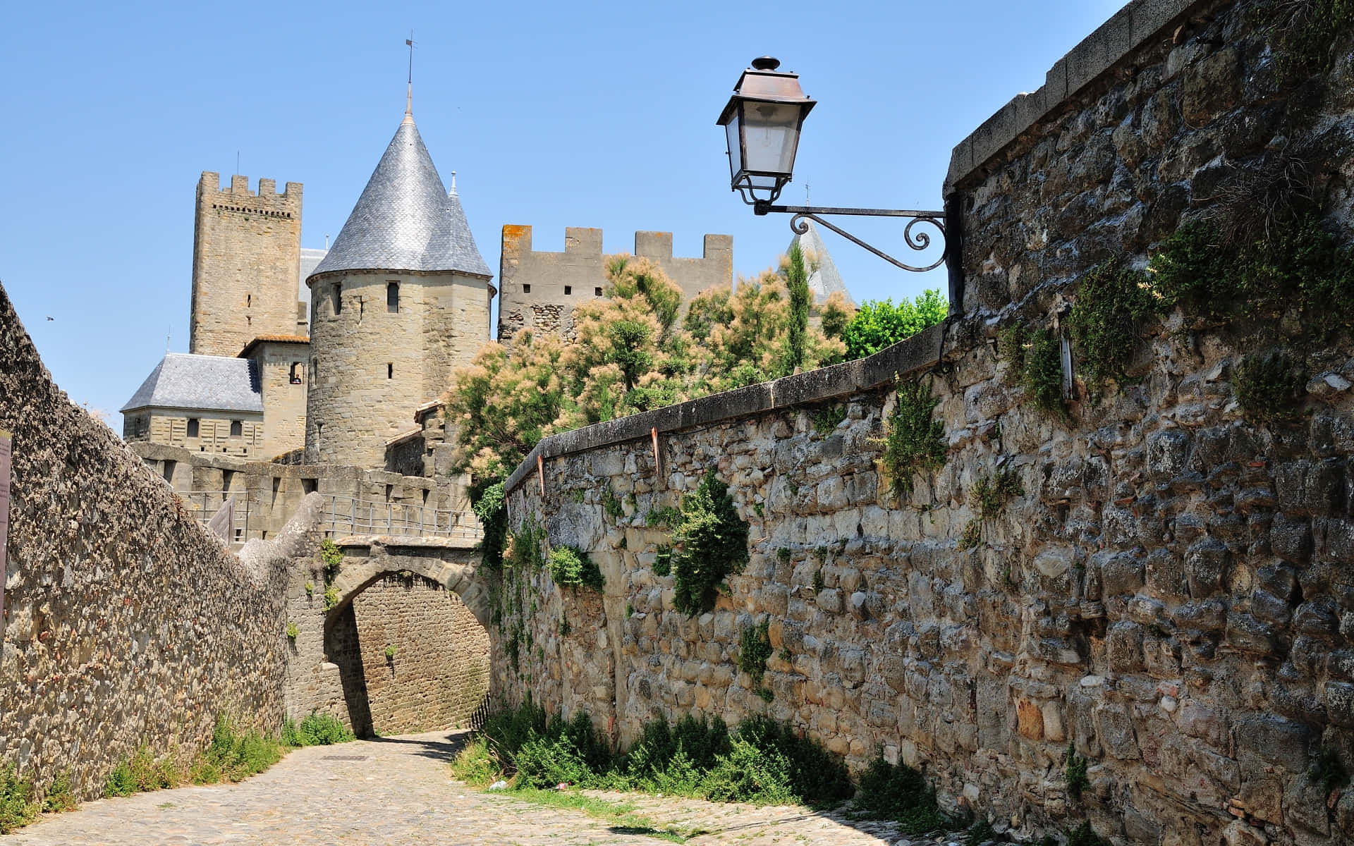 Arched Street In The Cite De Carcassonne Background