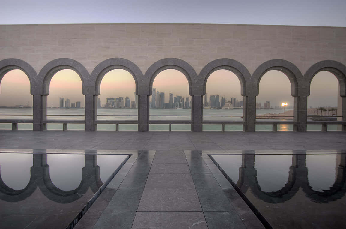 Archways Along The Museum Of Islamic Art Background