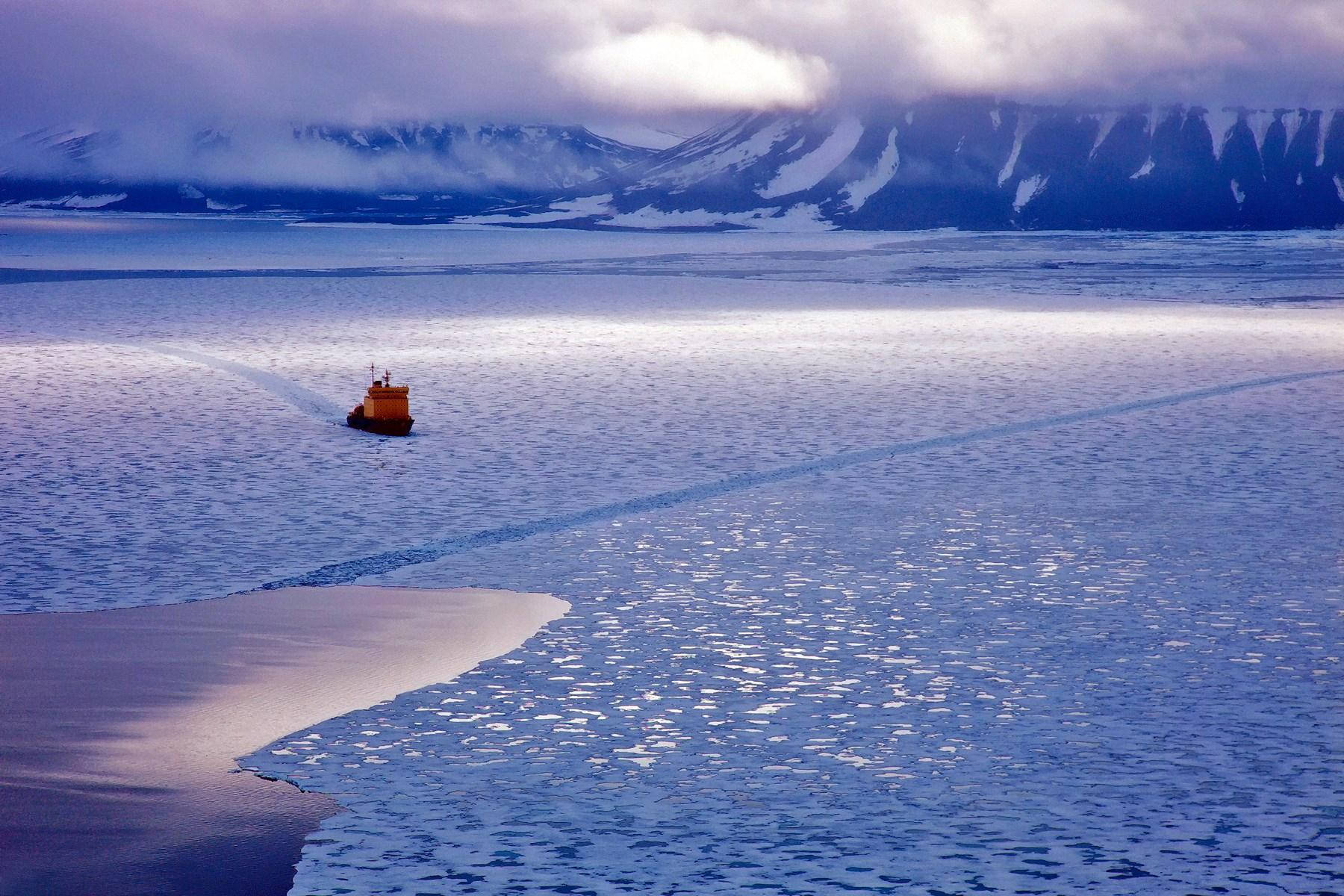 Arctic Waters With Orange Ship