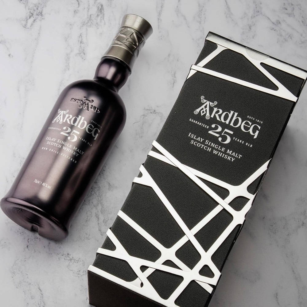 Ardbeg 25 Whisky On A White Marble Background