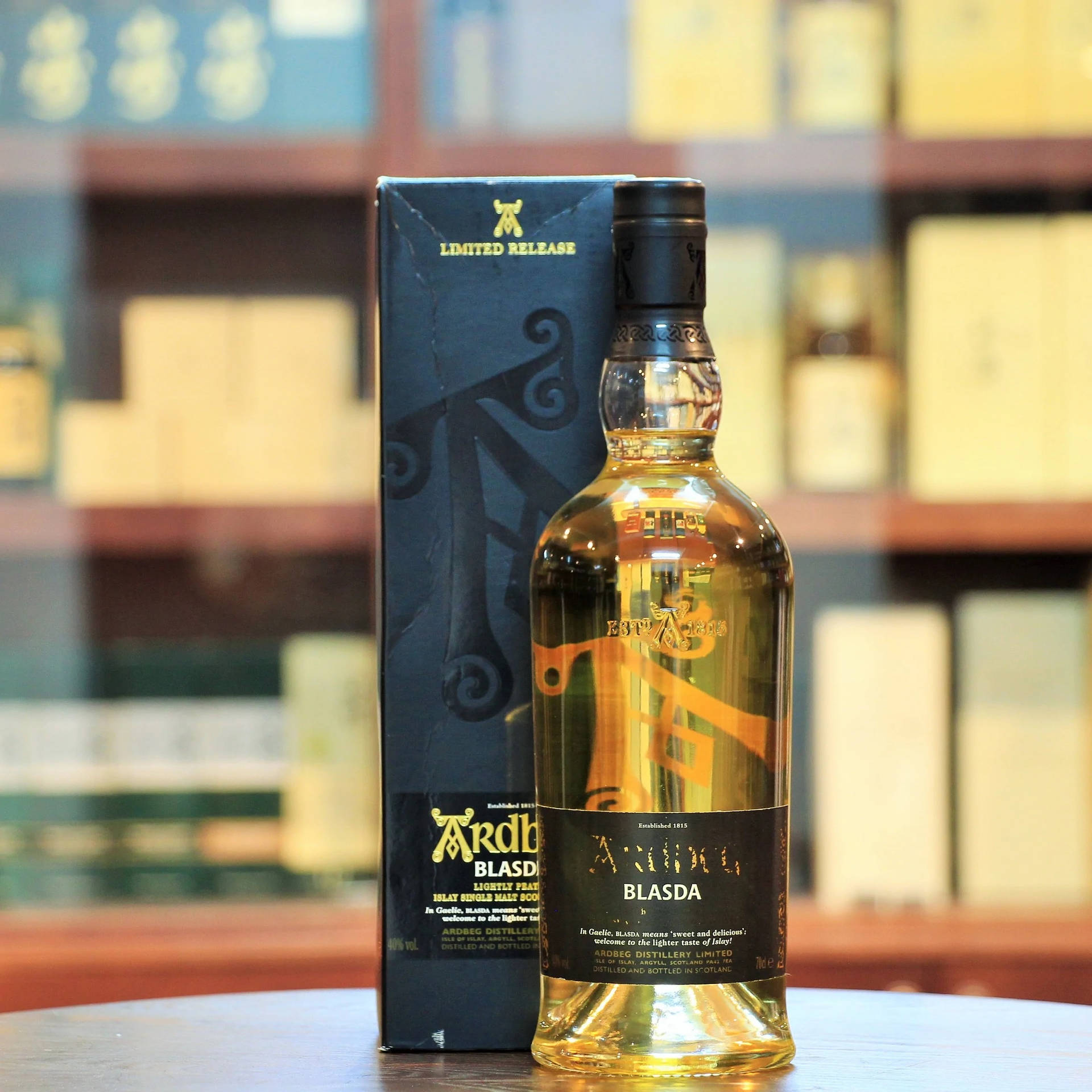 Ardbeg Blasta Whisky Bottle And Box Selective Focus Background